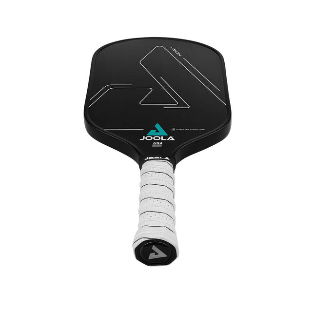 Das Vision CGS 16 Graphite Paddle hat eine schwarze, strukturierte Carbon-Griffoberfläche mit dem JOOLA-Logo und weissem Griff.